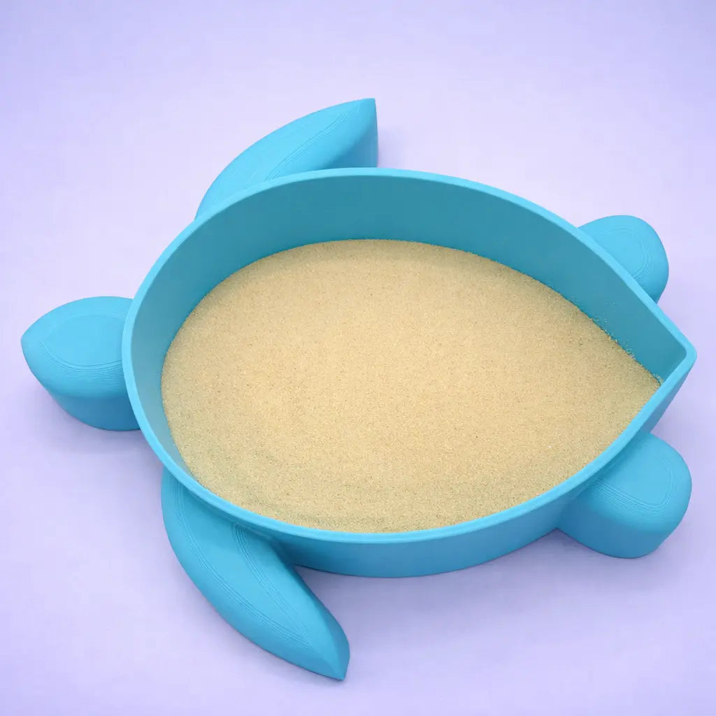 Turquoise turtle-shaped sand bath filled with sand, small animal dig box, gerbil dig box, gerbil sand box,  hamster dig box, hamster digging box, hamster sand dig box, hamster dig box UK, Pets at Home, Roselark Pet Products, Mr Mangos Makes