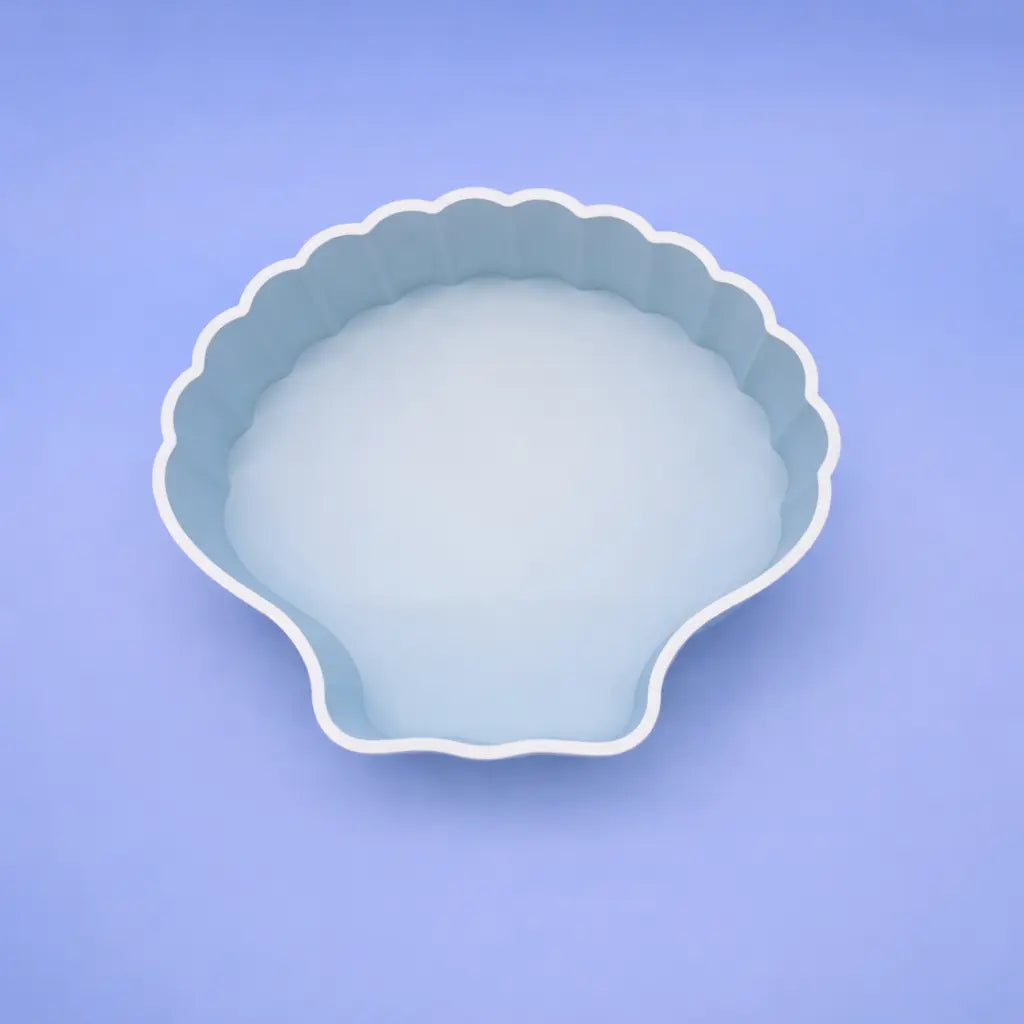 Light blue sea shell–shaped dig box and sand bath for hamsters and small animals