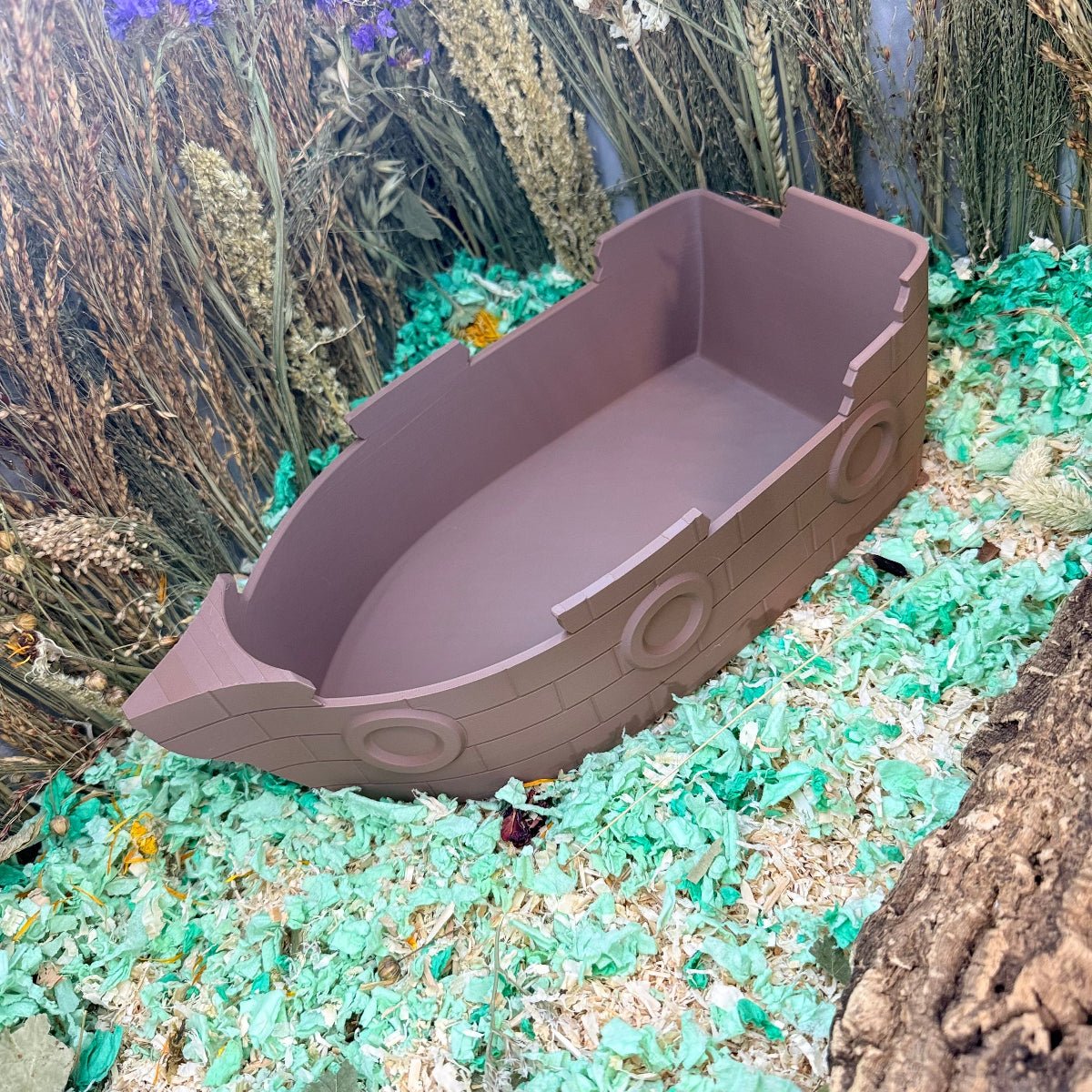 Hamster dig box shaped like a pirate ship