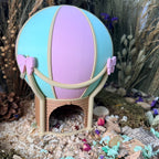 Pastel hot air balloon hamster hide in enclosure